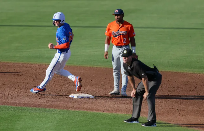 Florida outfielder Hayden Yost (16) makes it to second durning and NCAA baseball game at Condron Family Ballparkin Gainesville, FL on Friday, April 17, 2026. [Alan Youngblood/Gainesville Sun]