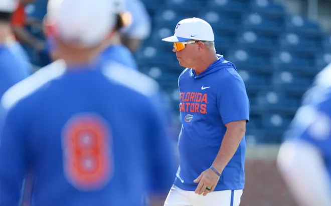 Florida head coach Kevin O'Sullivan heads to the dugout before an NCAA baseball game at Condron Family Ballparkin Gainesville, FL on Friday, April 17, 2026. [Alan Youngblood/Gainesville Sun]