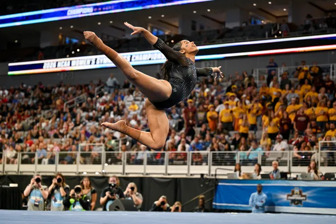 Apr 18, 2026; Fort Worth, TX, USA; University of Florida gymnast Emjae Frazier performs on floor exercise during the 2026 NCAA Women’s Gymnastics National Championships at Dickies Arena. Mandatory Credit: Jerome Miron-Imagn Images