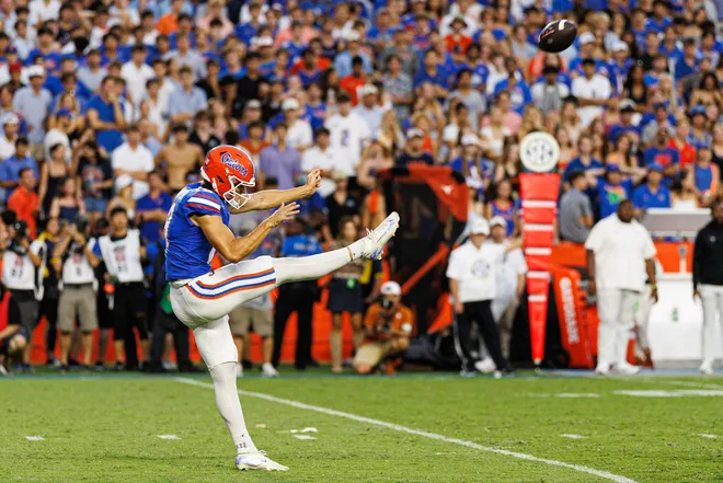Oct 4, 2025; Gainesville, Florida, USA; Florida Gators punter Tommy Doman (19) punts the ball against the Texas Longhorns during the second half at Ben Hill Griffin Stadium. Mandatory Credit: Matt Pendleton-Imagn Images