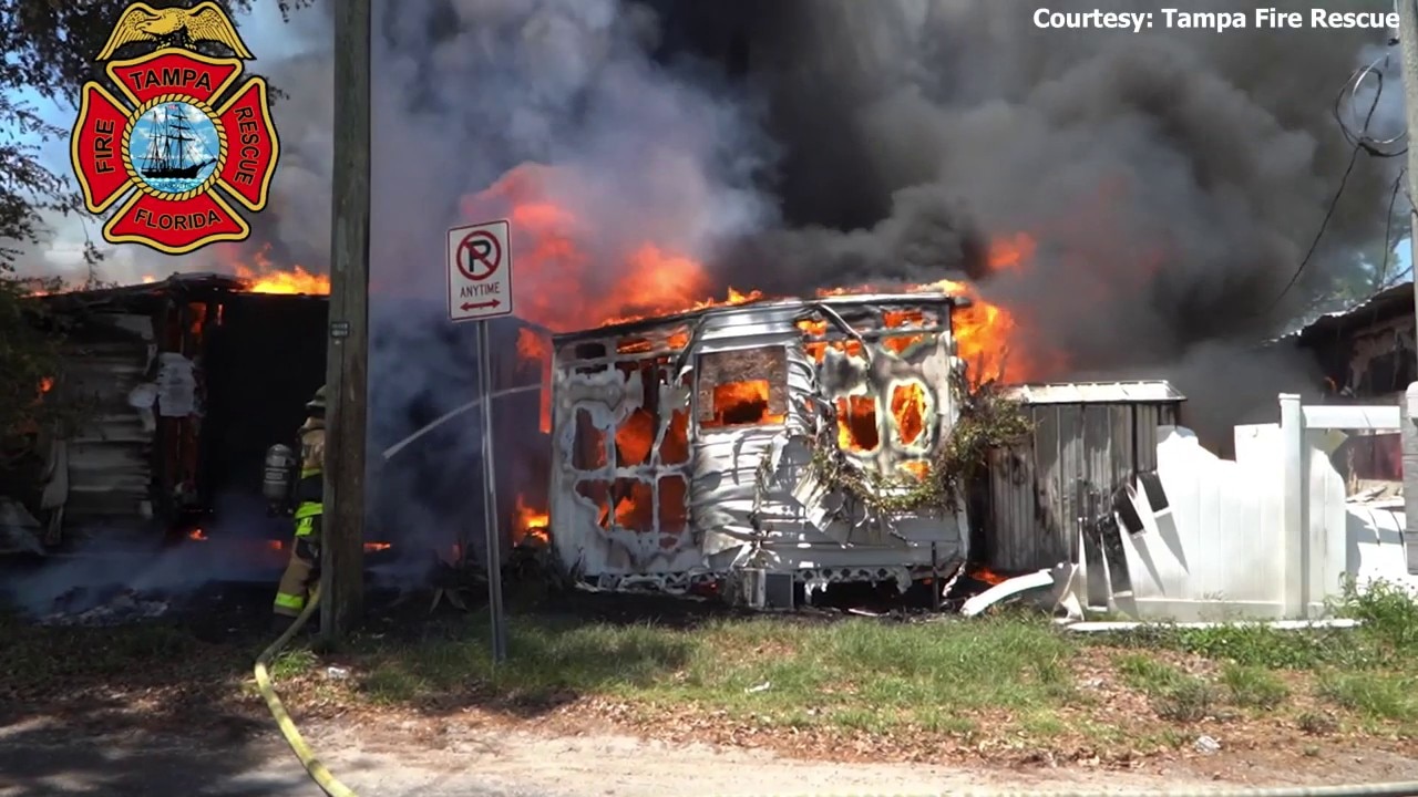 Dog rescued as fire spreads across mobile homes