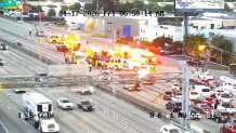 Traffic cameras captured several first responders blocking all lanes as they worked the scene. Video also showed an air rescue helicopter landing on the roadway. 