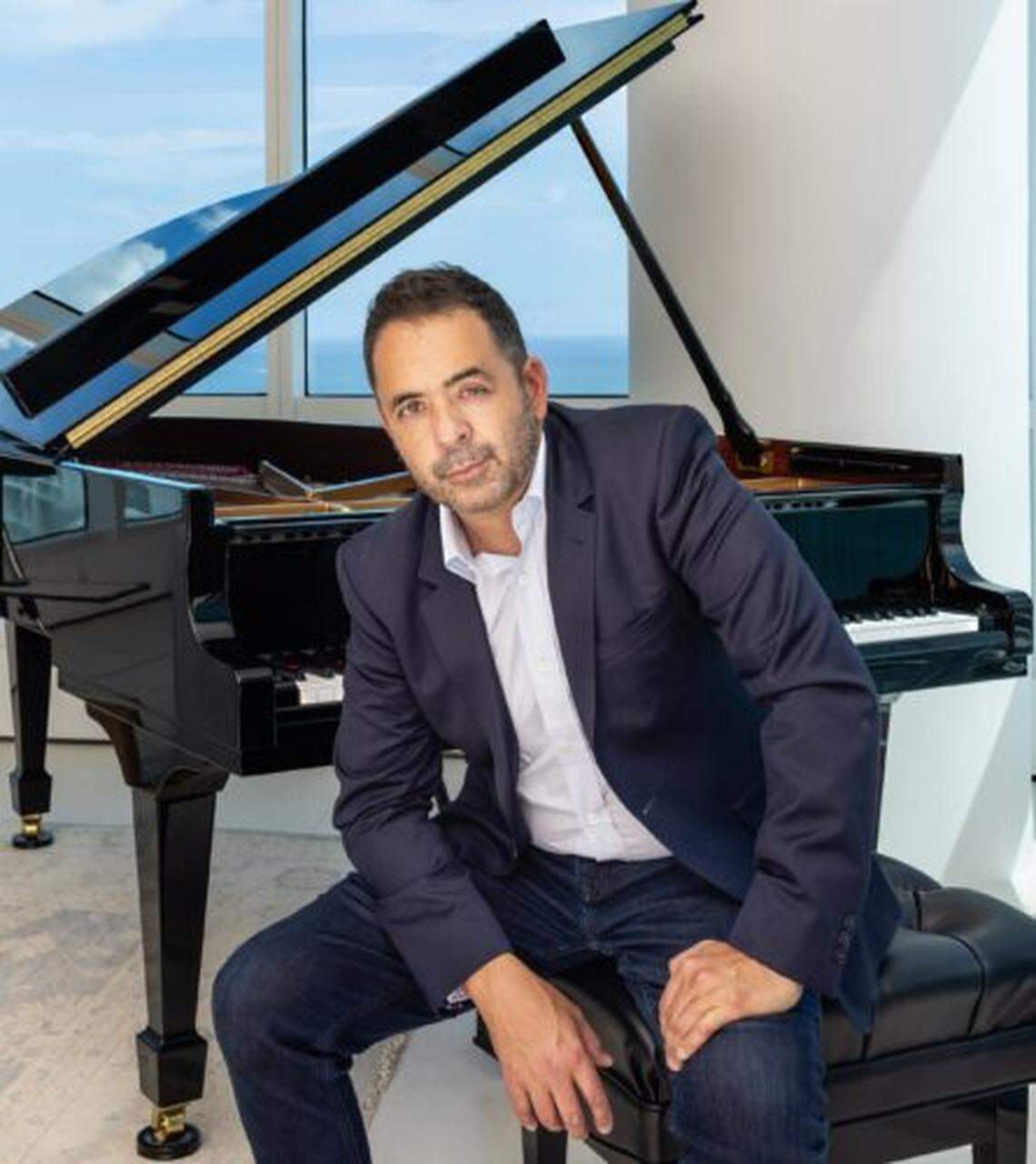 Jorge Mejia, composer and pianist who has lived in Miami for more than 40 years, will perform his concerto “If These Walls Could Talk” with the Frost Symphony Orchestra at the Adrienne Arsht Center.