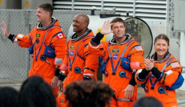 Astronauts , from left, Mission Specialist Jeremy Hansen, of Canada, Pilot Victor Glover, Commander Reid Wiseman and Mission Specialist Christina Koch leave the Operations and Checkout Building for a trip to Launch Pad 39-B and a planned liftoff on NASA's Artermis II moon rocket at the Kennedy Space Center Wednesday, April 1, 2026, in Cape Canaveral, Fla. (AP Photo/Chris O'Meara)