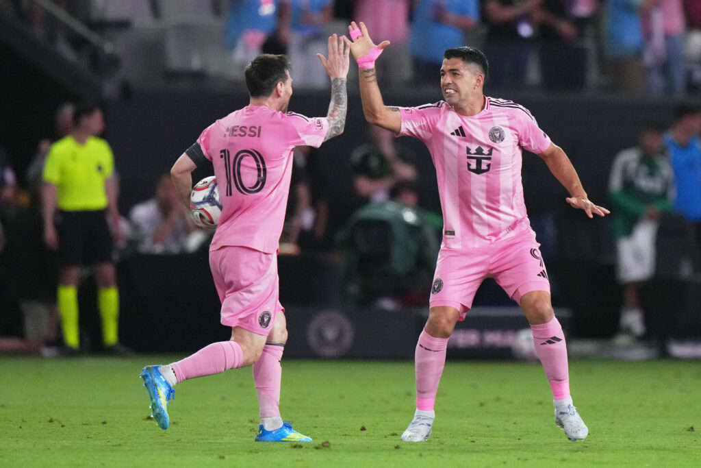 Inter Miami CF forward Luis Suárez, right, celebrates with forward Lionel Messi 