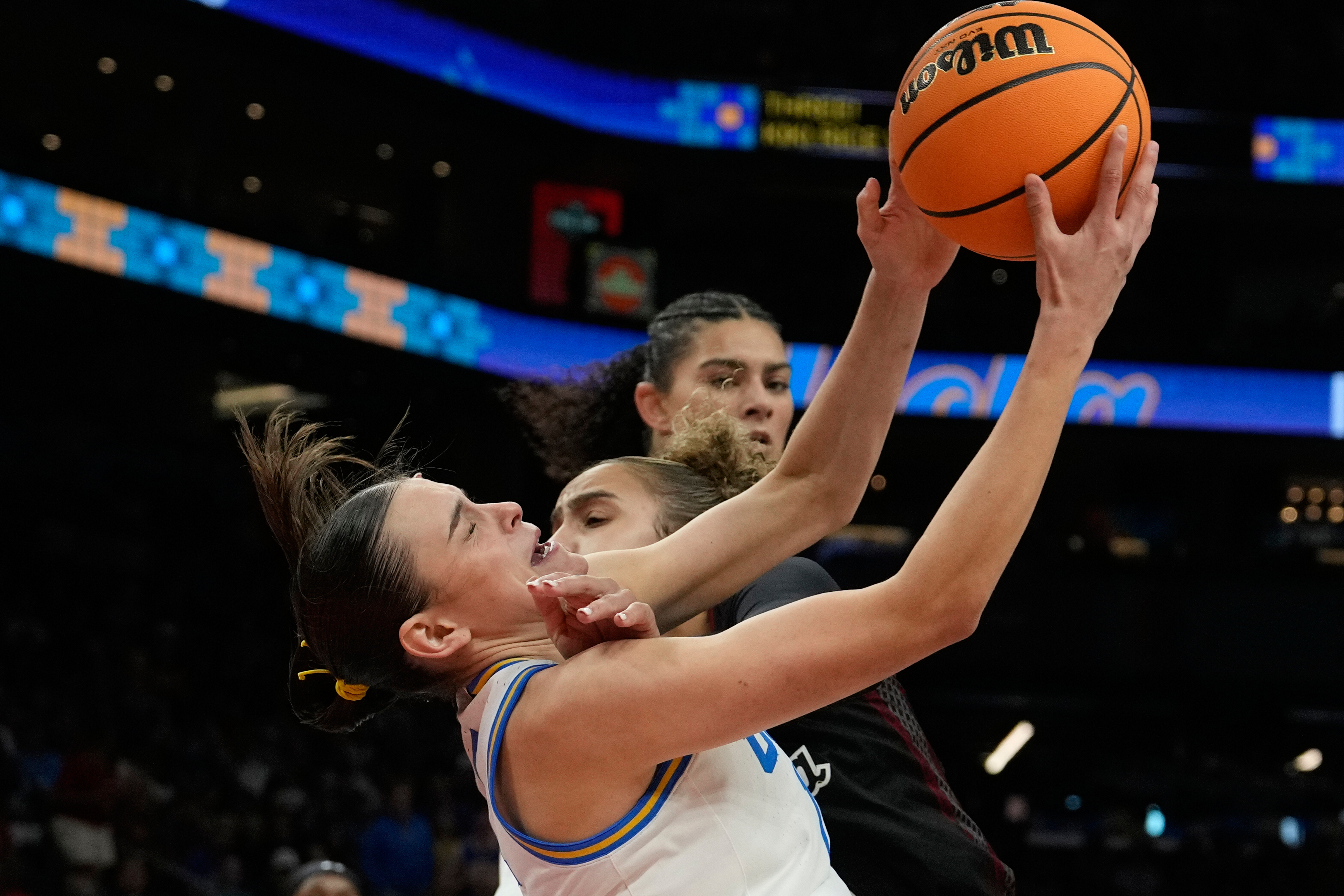 UCLA guard Gabriela Jaquez (11) grabs a rebound over South...