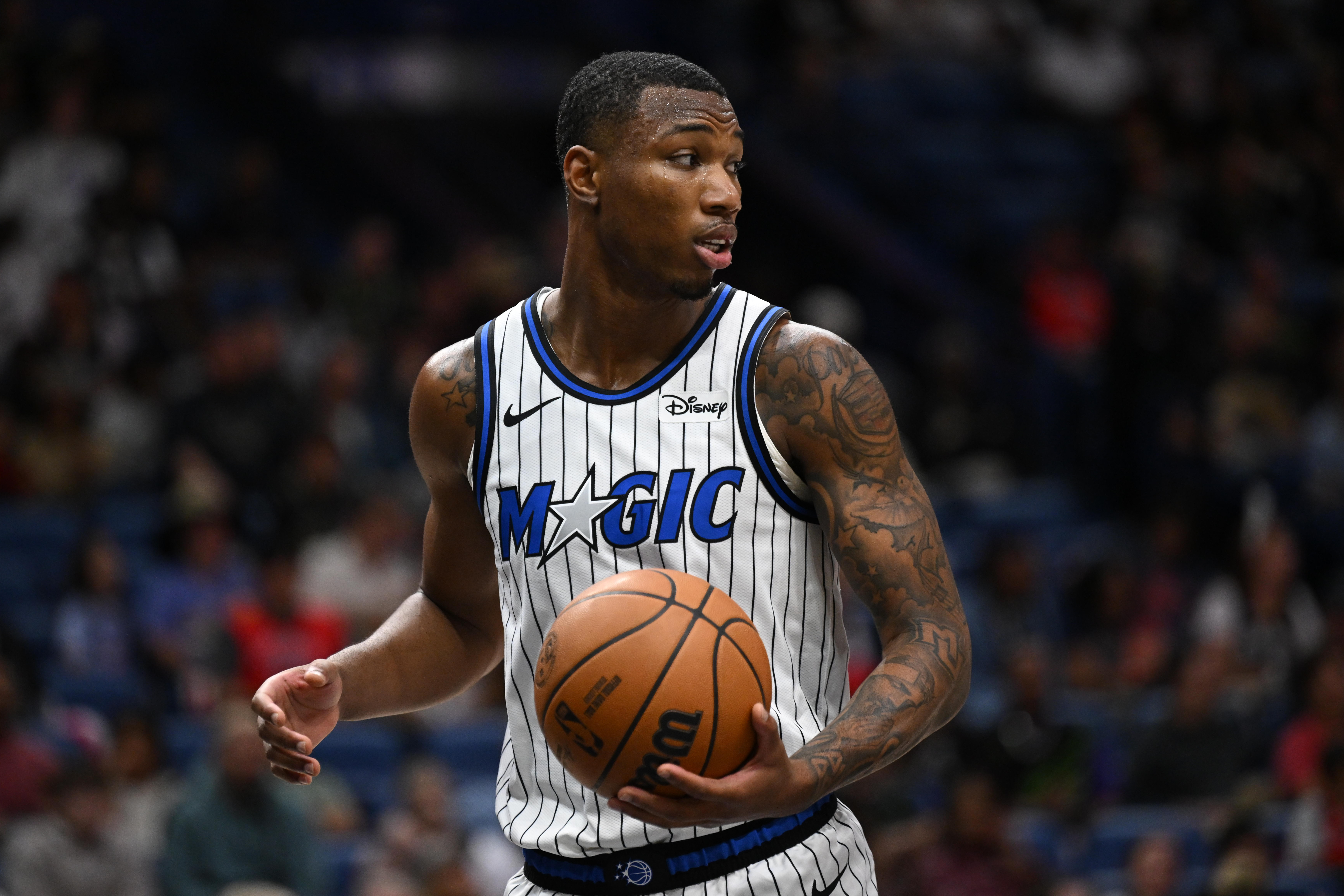 Orlando Magic forward Jamal Cain (8) looks to pass in...