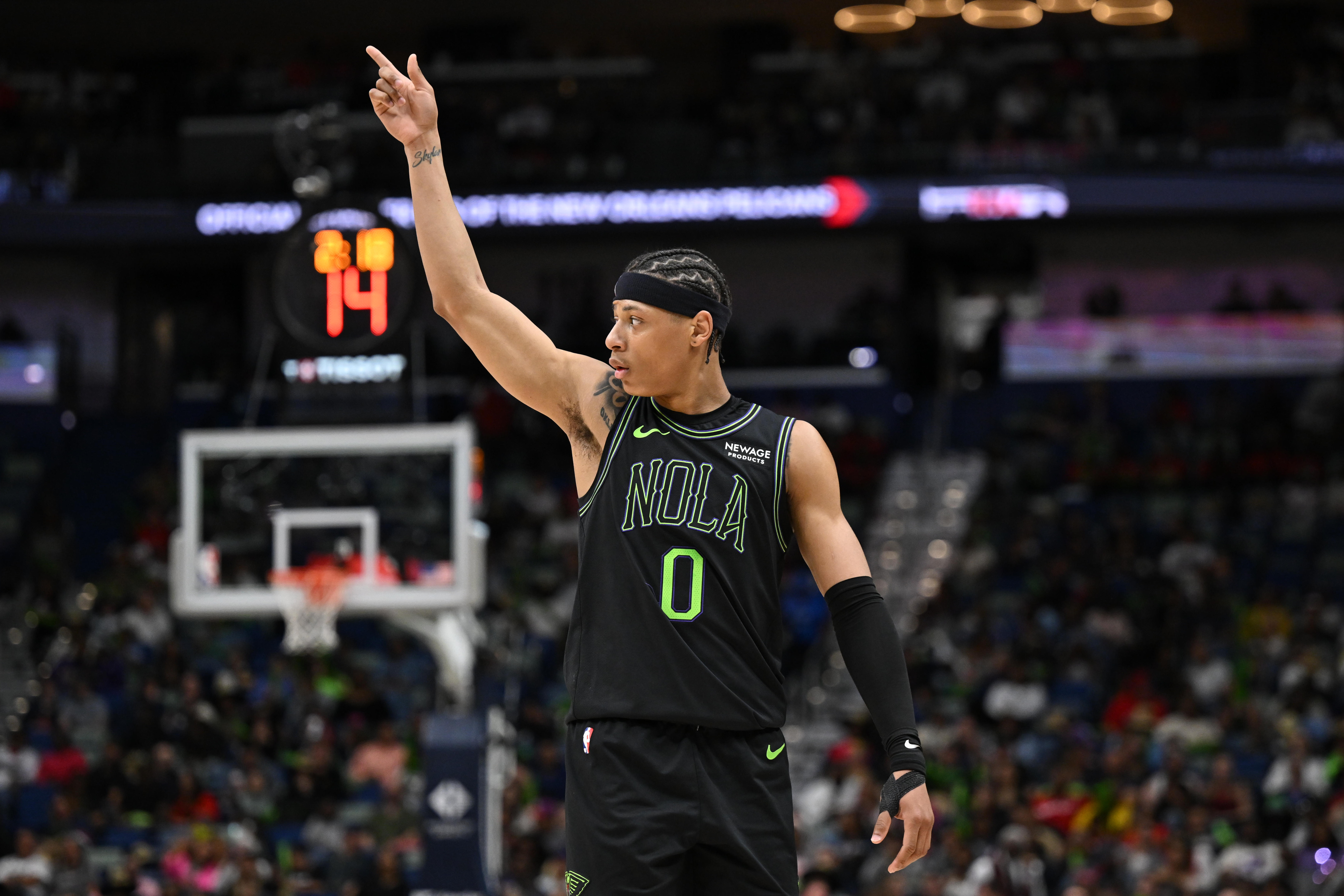 New Orleans Pelicans guard Jeremiah Fears (0) celebrates in the...