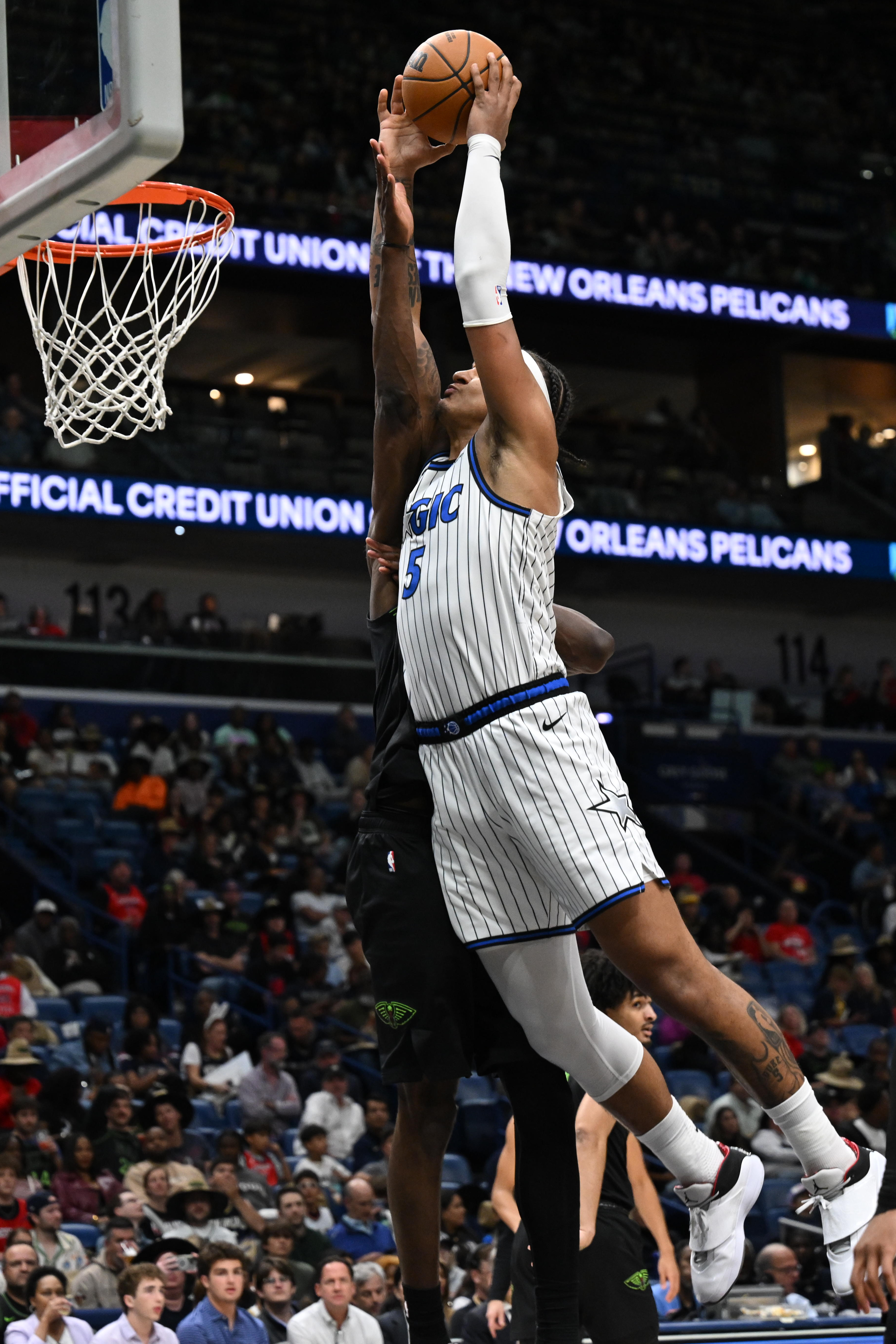 Orlando Magic forward Paolo Banchero (5) dunks in the second...