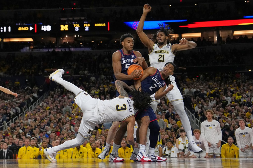 Michigan beats UConn 69-63 to win NCAA basketball title
