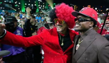 University of Miami defensive end Rueben Bain Jr. celebrates with fans after being drafted by the Tampa Bay Buccaneers with the 15th pick of the first round of the NFL Draft Thursday night. (AP Photo/Sue Ogrocki)