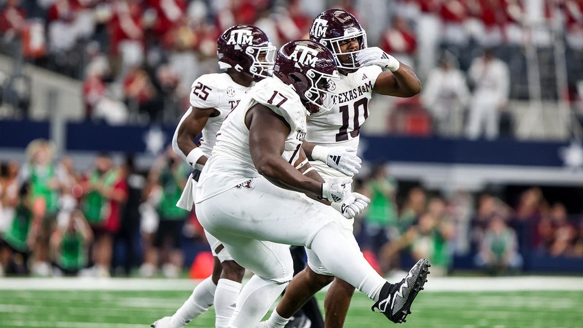 Albert Regis reacts after getting a sack