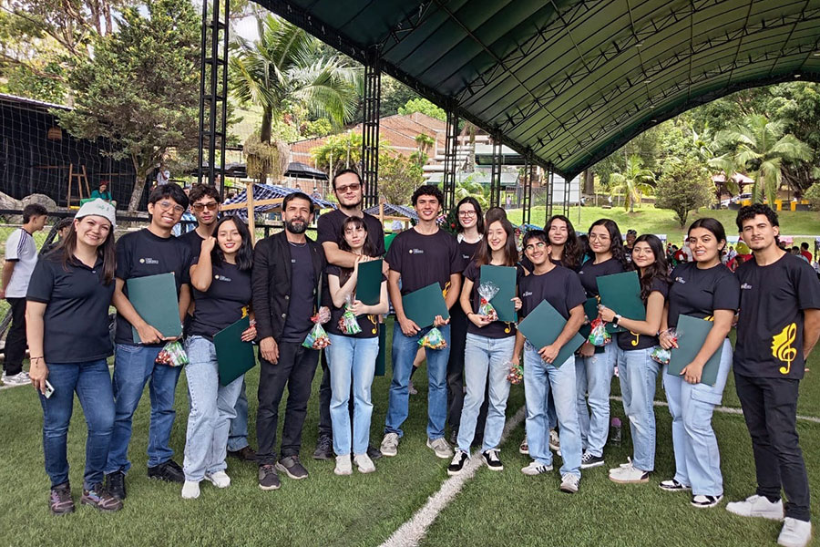 Amelia Rivers, a recent graduate of the College of Music, alongside “Coro Polifónico,” UCO’s polyphonic choir, during their Christmas concert series. (Amelia Rivers)