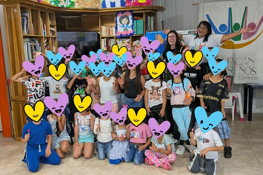 Amelia Rivers, a recent graduate of the College of Music, volunteering with the Huracán de Sueños foundation. Led by Patricia Garcia, the foundation provides after-school activities to underprivileged children in the area. (Amelia Rivers)