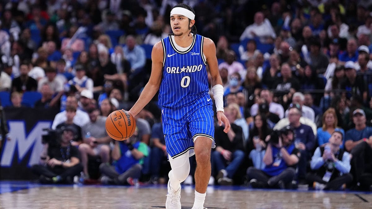 Anthony Black dribbling during a game