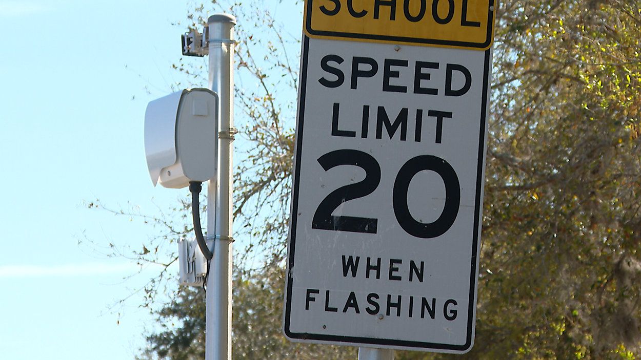 Sign warns drivers of lower speed limit, during arrival and dismissal periods outside a Hillsborough County school. (Spectrum News)