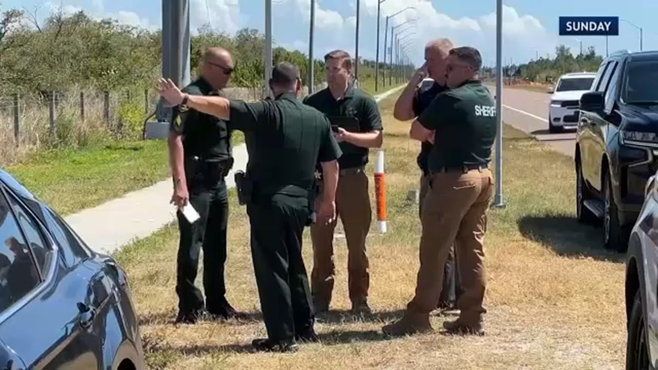 Sheriff's deputies search an area near I-275 and 4th Street where human remains were discovered on Sunday. (Spectrum News)