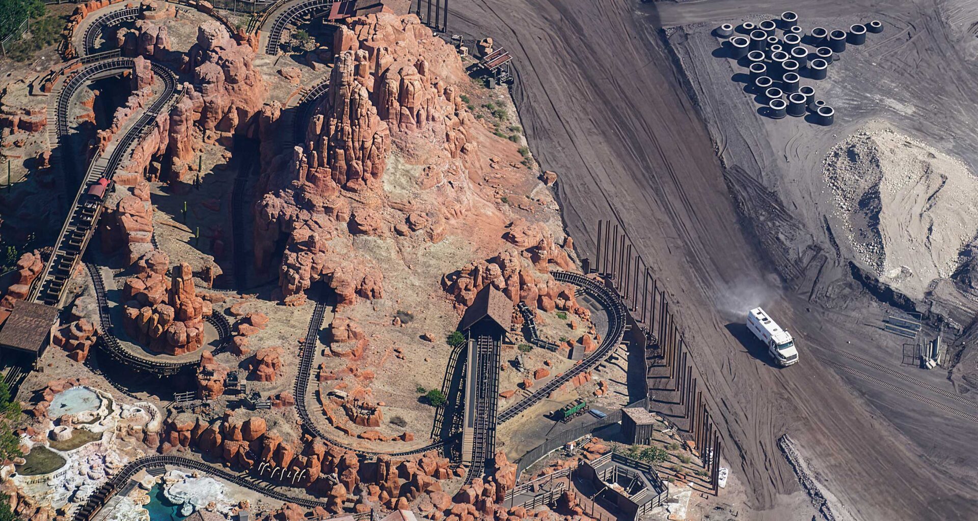 Disney Building Tall Wall Around Big Thunder Mountain to Hide Cars and Villains Land Construction