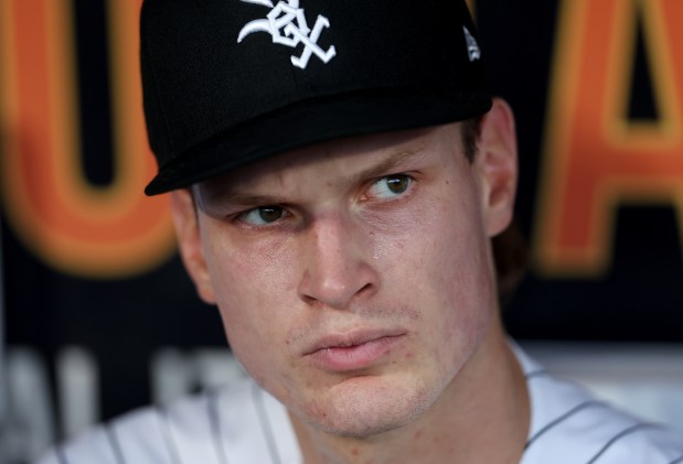 Chicago White Sox starting pitcher Noah Schultz (22) sits in the dugout before taking the field for his first MLB appearance against the Tampa Bay Rays at Rate Field in Chicago on April 14, 2026. (Chris Sweda/Chicago Tribune)
