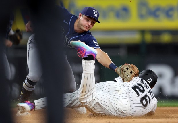 Chicago White Sox catcher Edgar Quero steals second base as Tampa Bay Rays second baseman Ben Williamson (15) is unable to place a tag on Quero in the third inning of a game at Rate Field in Chicago on April 14, 2026. (Chris Sweda/Chicago Tribune)