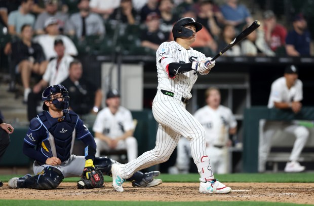 Chicago White Sox first baseman Munetaka Murakami hits a two-run home run in the ninth inning of a game against the Tampa Bay Rays at Rate Field in Chicago on April 14, 2026. (Chris Sweda/Chicago Tribune)