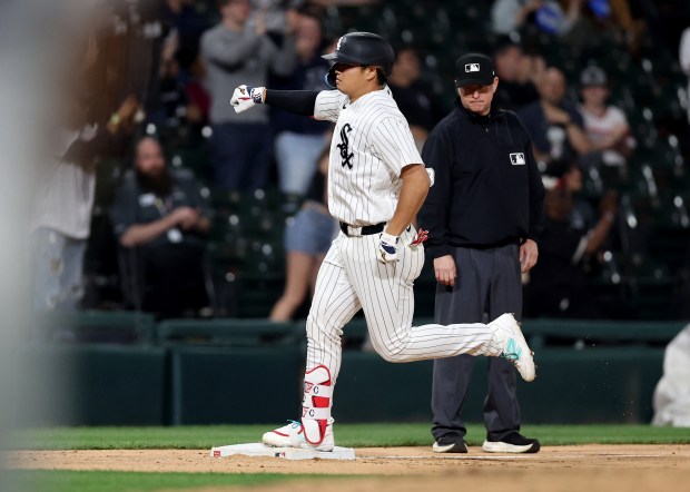 Chicago White Sox first baseman Munetaka Murakami celebrates as he rounds the bases after hitting a two-run home run in the ninth inning of a game against the Tampa Bay Rays at Rate Field in Chicago on April 14, 2026. (Chris Sweda/Chicago Tribune)