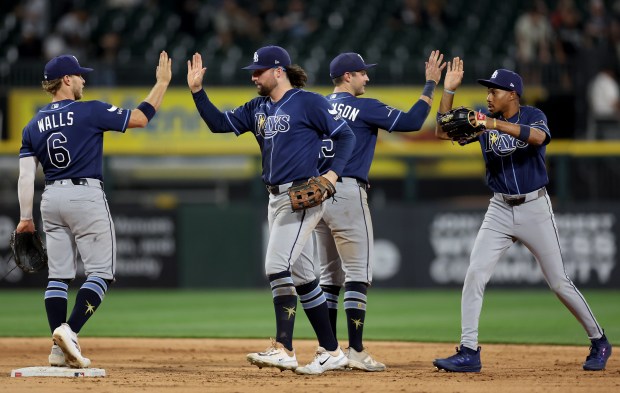 The Tampa Bay Rays celebrate after their victory over the Chicago White Sox at Rate Field in Chicago on April 14, 2026. (Chris Sweda/Chicago Tribune)