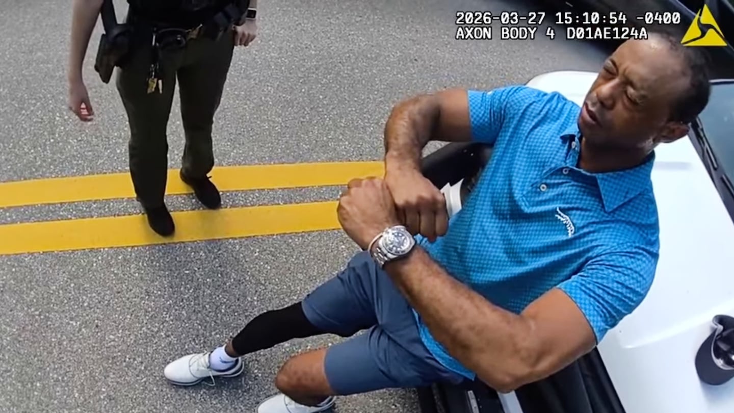 In this image taken from police body camera video provided by the Martin County Sheriff’s Office, Tiger Woods performed a sobriety test.