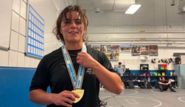 East Lake senior wrestler wins gold and makes history