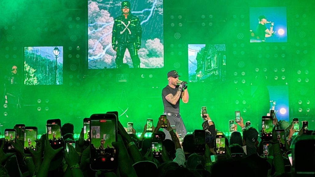 Photo of Feid performing on stage at the Fillmore Miami Beach. 