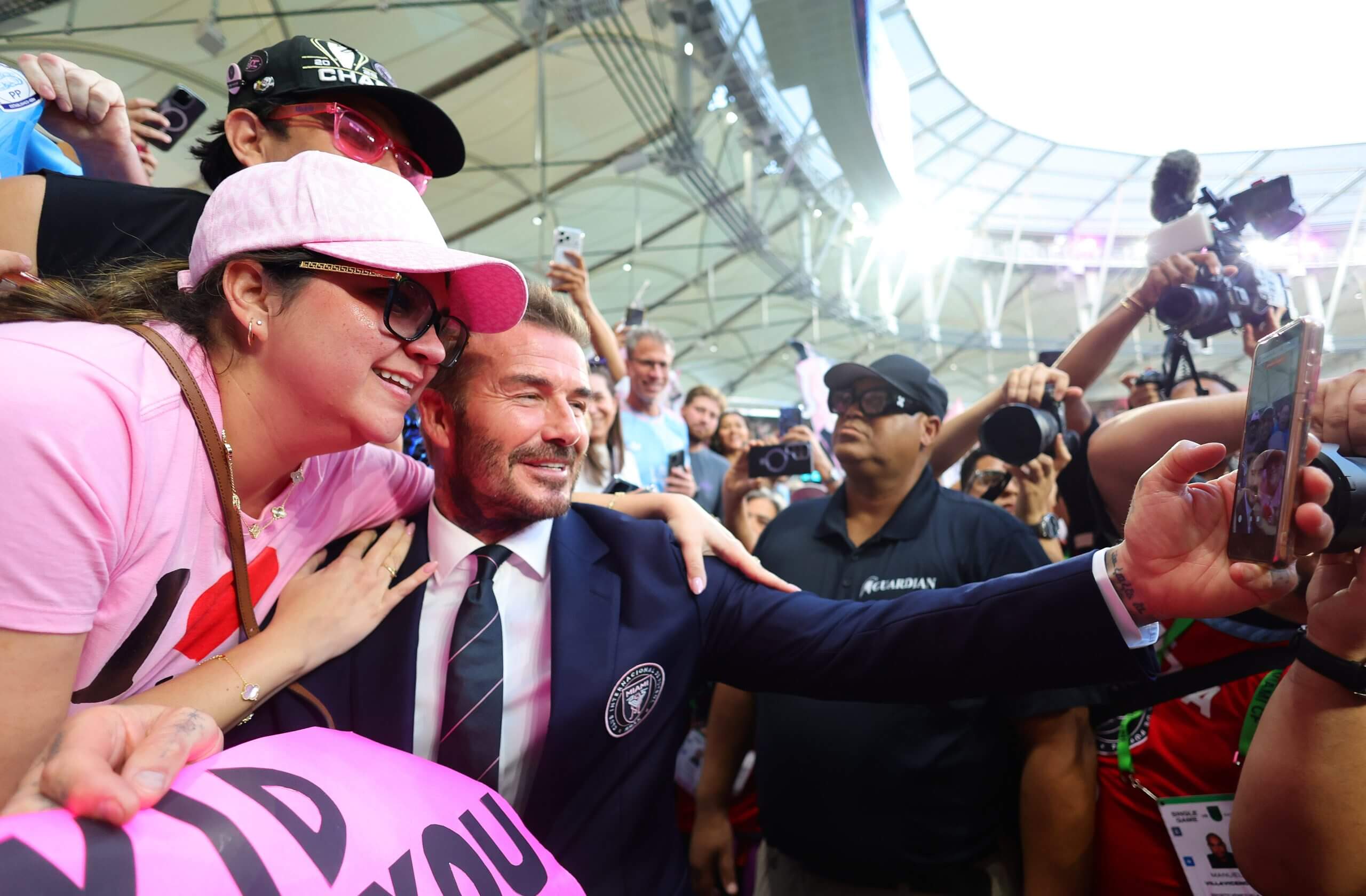 David Beckham takes a selfie with a Miami fan