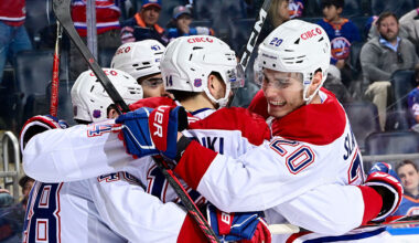 ELMONT, NEW YORK - APRIL 12: Nick Suzuki #14 of the Montreal Canadiens celebrates after scoring his 100th point of the season during the second period against the New York Islanders at UBS Arena on April 12, 2026 in Elmont, New York. (Photo by Steven Ryan/NHLI via Getty Images)