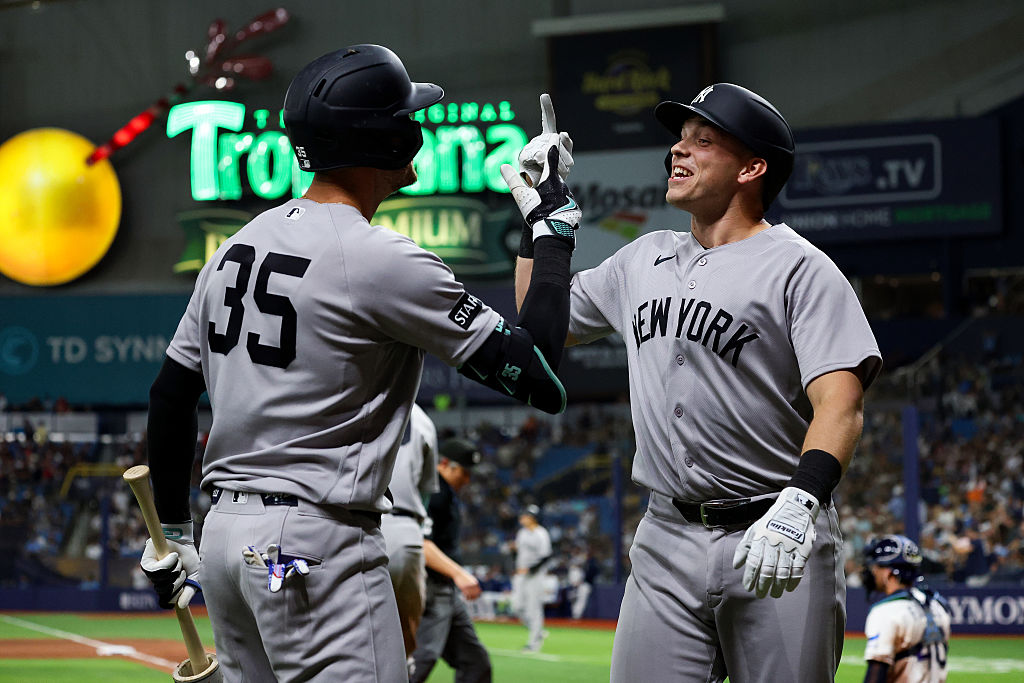 ST. PETERSBURG, FL - APRIL 10: Cody Bellinger #35 high fives Ben Rice #22 of the New York Yankees during the game against the Tampa Bay Rays at Tropicana Field on April 10, 2026 in St. Petersburg, Florida.