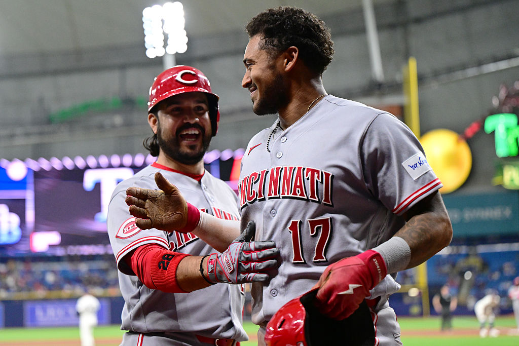 ST PETERSBURG, FLORIDA - APRIL 21: Dane Myers #17 celebrates with Eugenio Suárez #28 of the Cincinnati Reds after scoring in the sixth inning against the Tampa Bay Rays at Tropicana Field on April 21, 2026 in St Petersburg, Florida.