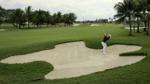 Adam Scott of Australia out of the bunker on the 14th hole during the third round of the World Golf Championships-Cadillac Championship at Trump National Doral Blue Monster Course on March 5, 2016 in Doral, Florida. (Photo by Mike Ehrmann/Getty Images)