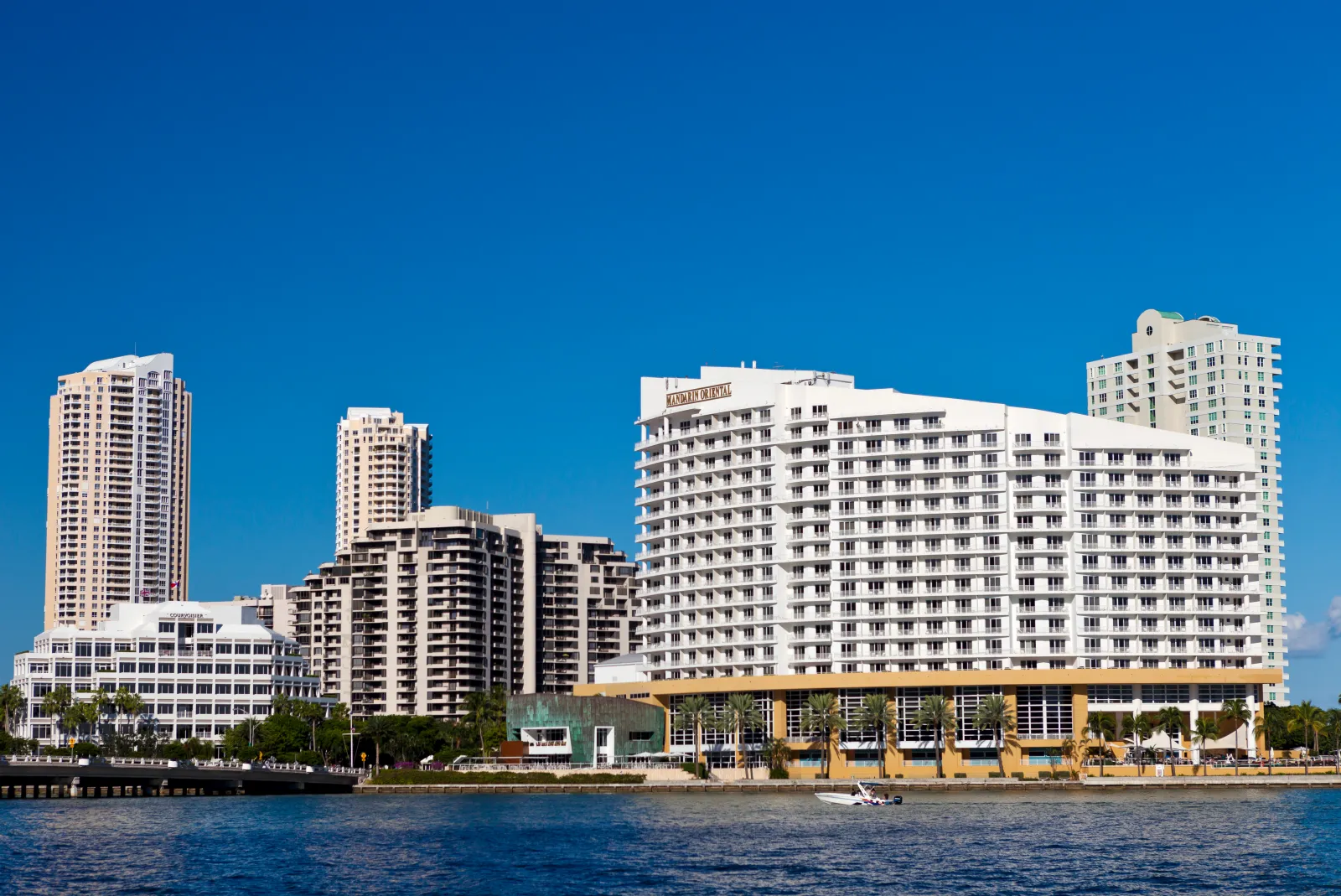 The Mandarin Oriental Hotel and other buildings on Brickell Key overlooking Biscayne Bay in Miami, Florida.