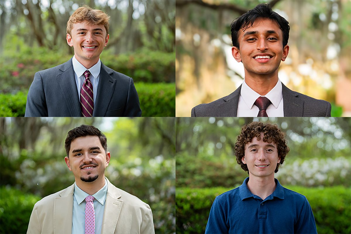 A composite of four individual headshots of young men, arranged in a two-by-two grid. All four are smiling and posed outdoors against a soft-focus background of lush green trees and foliage.