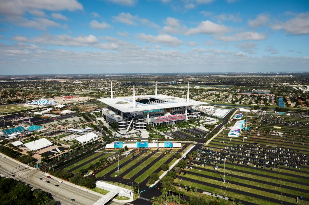 a football stadium surrounded by parking lots