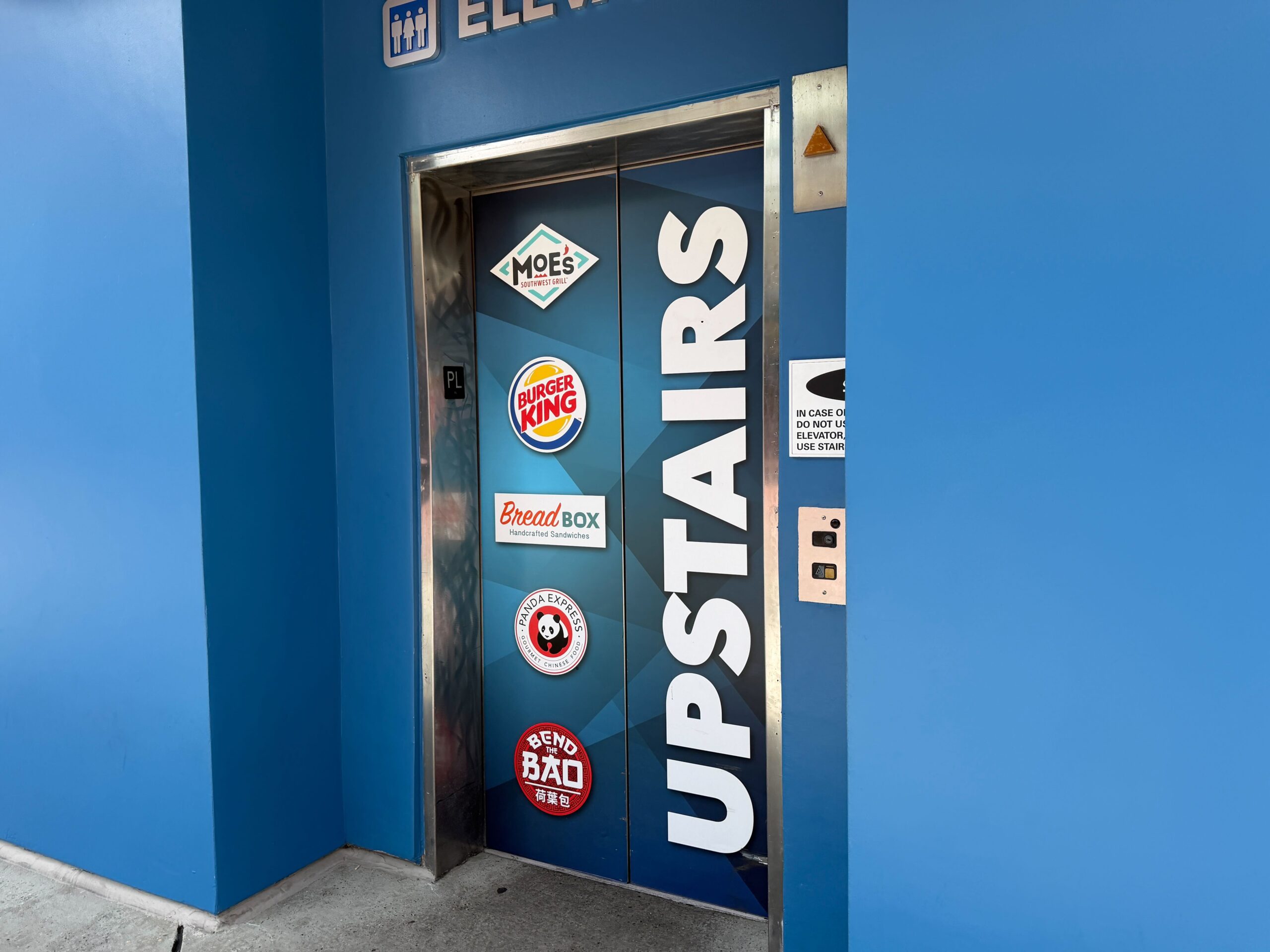 The Burger King signage is still on the elevator, which takes guests up to the food court area. Other restaurants still in the spot are Moe's Southwest Grill, Bread Box, Panda Express, and Bend the Bao.