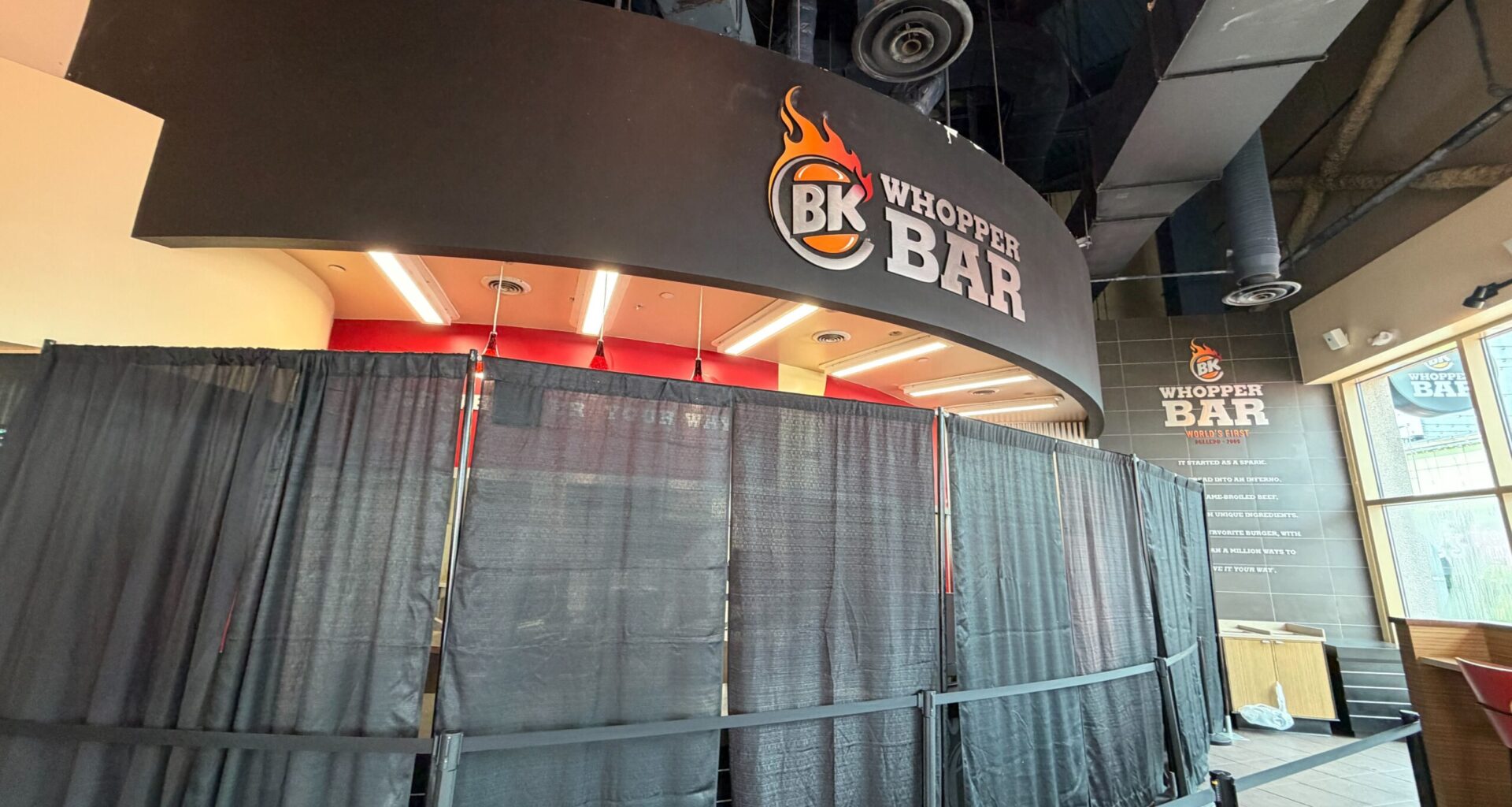 The Burger King signage is still on the elevator, which takes guests up to the food court area. Other restaurants still in the spot are Moe