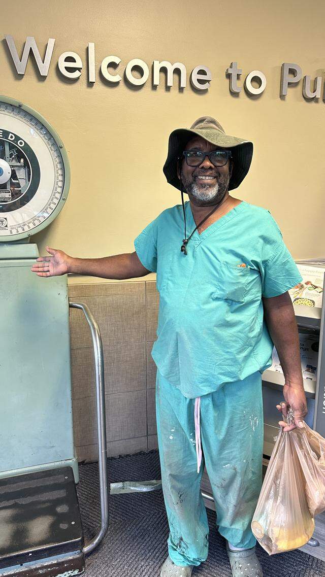 Publix customer John Bonaby loves Publix scales and hopes they remain. “If I want to weigh myself, I just go to Publix,” he said, smiling next to the scale at the old Coral Gables Publix at 1401 Monza Avenue on April 1, 2026.