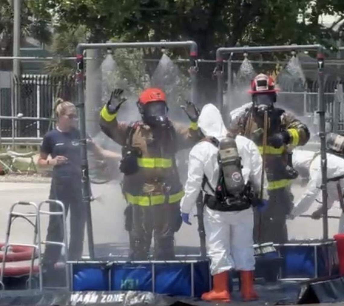 Fort Lauderdale Fire Rescue members are washed down after being exposed to anhydrous ammonia at a Port Everglades cold-storage facility Tuesday morning, April 28, 2026.