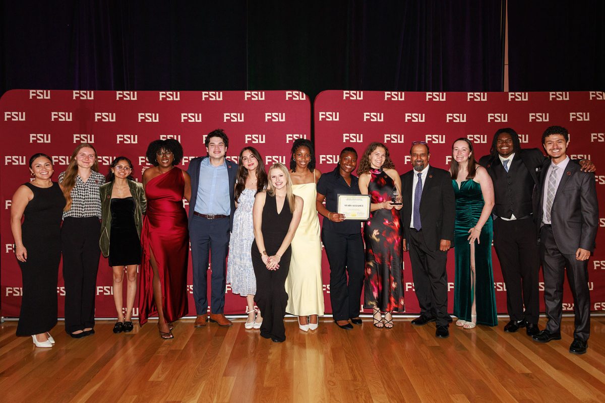 S.T.A.R.S. Alliance students pose for a photo after being named the Mary B. Coburn Organization of the Year