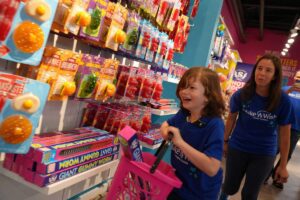 Make A Wish visits IT’SUGAR at Downtown’s Bayside Marketplace