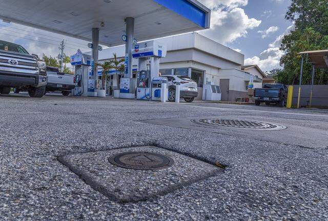 View of a monitoring well manhole cover in the grounds of a Chevron gas station located in the Morningside neighborhood in Miami, on Tuesday, March 31, 2026.