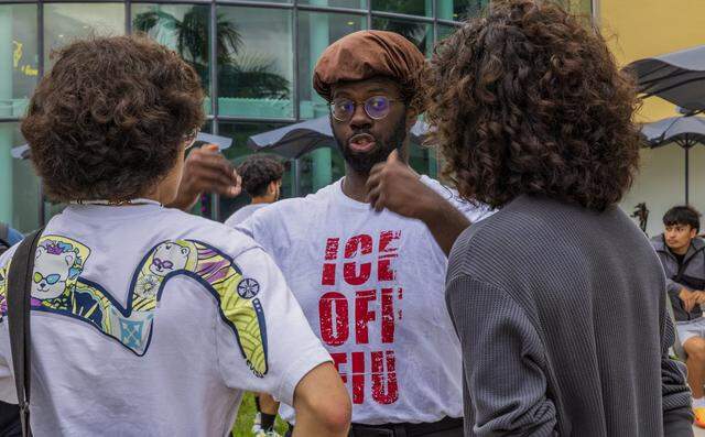 Carlton Daley (center), co-president of FIU's Young Democratic Socialists of America, was among a group of people from different campus organizations and several street organizations protested against the university's president Jeanette M. Nuñez, and the association of the campus' police with ICE, in front of the Graham Center at Florida International University, in Miami, on Tuesday, April 07, 2026.