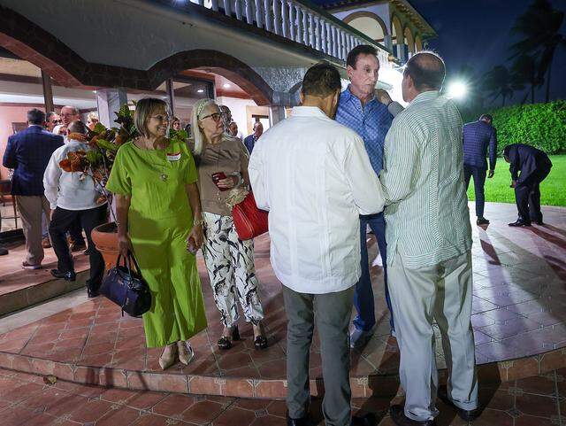 Jorge Suarez-Menendez, center, talks with Cuban and Cuban-American entrepreneurs as they gathered at his home for a private event on Tuesday, March 31, 2026, in Miami, Florida, to organize and pledge to invest in Cuba if there is a change in government.