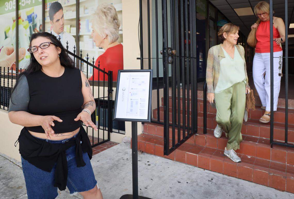 Tour organizer and resident artist Luna Palazzolo-Daboul, left, explains the art space concept as ICA cohorts exit after a tour of the Tunnel Projects, a multifaceted art space dedicated to supporting local artists on Saturday, April 11, 2026, in Little Havana, Miami, Florida.