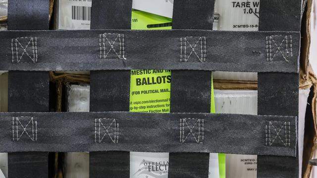 Carts full of Vote-by-Mail Ballots are loaded onto a USPS truck at the Miami-Dade's Supervisor of Elections Office in Doral, Florida on Thursday, March 19, 2026. The ballots will be delivered to voters for the upcoming City of Coral Gables elections.