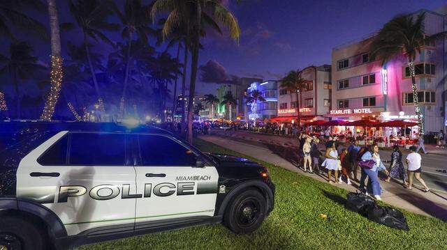 Miami Beach police increased enforcement of a city ordinance banning public camping in mid-2024, heeding the requests of elected officials. The number of camping arrests more than tripled in 2025. Here, a Miami Beach patrol car is parked as officers overlook Ocean Drive in the neighborhood of South Beach on Miami Beach, Florida, on Friday, March 20, 2026.